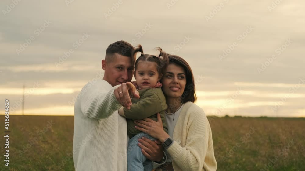 Happy family: mother father and child daughter on nature on sunset. Happy family: mother father and child daughter on nature on sunset.