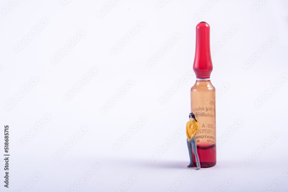 Person with ampoule. Diorama. Young woman.