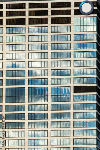 Close-Up of mirrored modern office building windows.