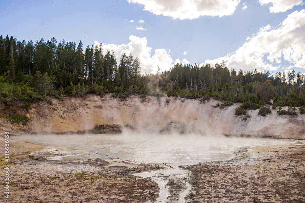 Sunny view of the landscape around Mud Volcano in Yellowstone National Park Sunny view of the landscape around Mud Volcano in Yellowstone National Park