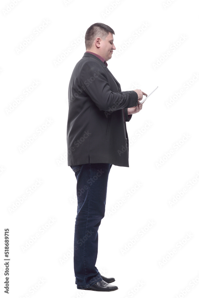 side view. Mature business man with a digital tablet. side view. Mature business man with a digital tablet.