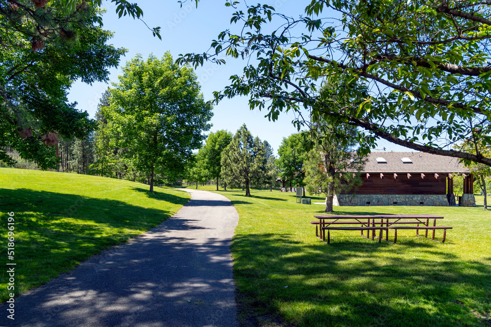 The suburban Mirabeau Point Park in Spokane Valley, Washington, USA on a summer day. The suburban Mirabeau Point Park in Spokane Valley, Washington, USA on a summer day.