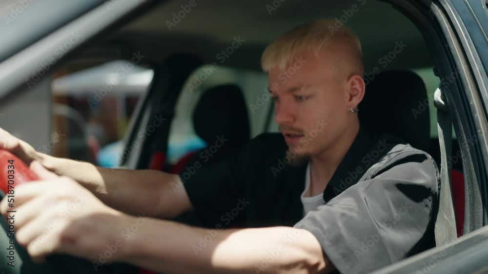 Young caucasian man smiling confident driving car at street Young caucasian man smiling confident driving car at street