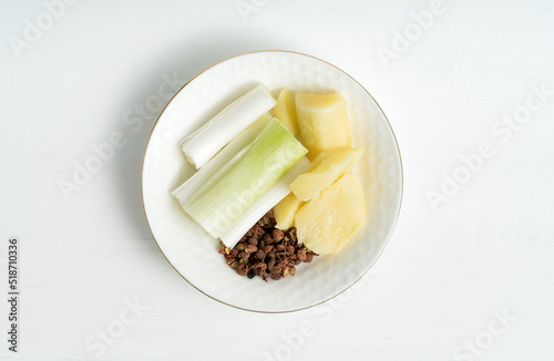 Home-cooked meat stew seasoning on a solid background photo