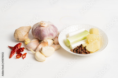 Home-cooked meat stew seasoning on a solid background photo