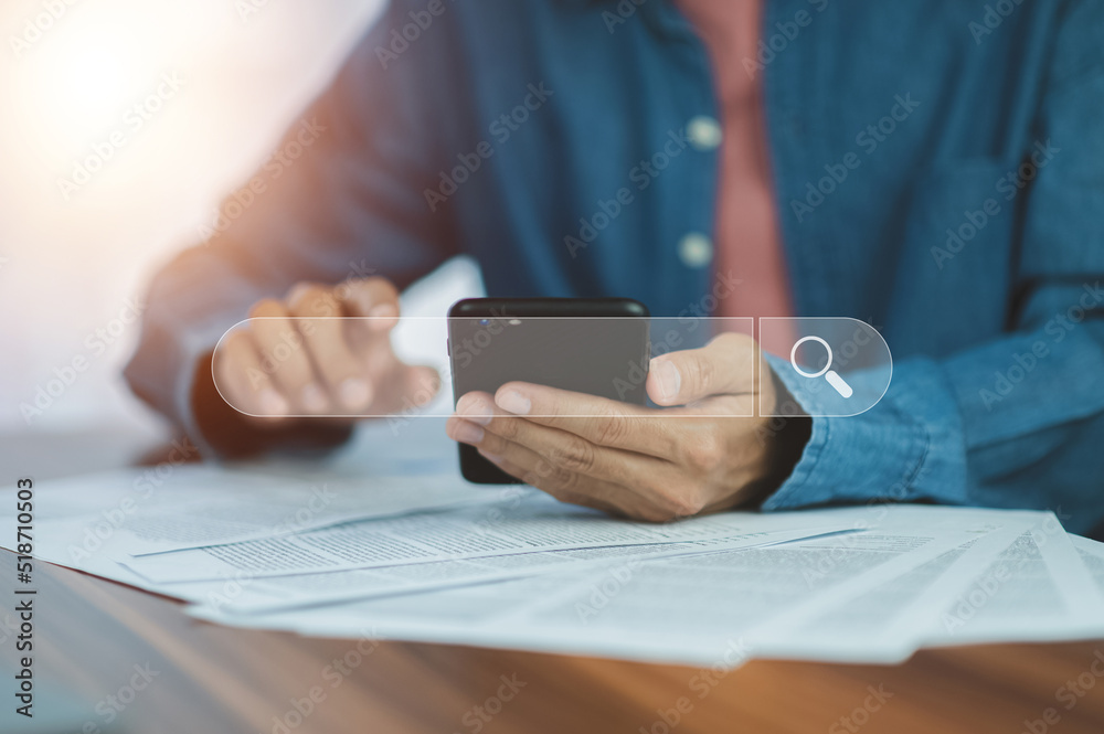 Fototapeta premium Man using smartphone search on internet mobile