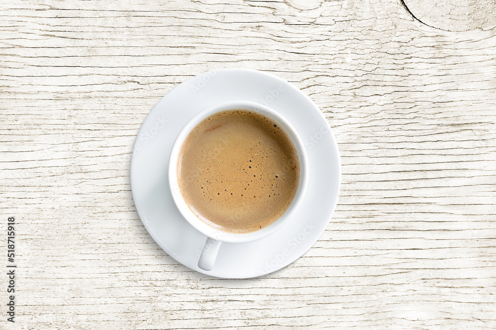 coffee mug, top view, isolated on white wooden table coffee mug, top view, isolated on white wooden table