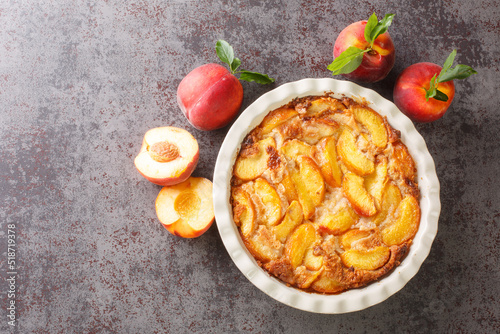 Canvastavla Freshly baked peach cobbler closeup in the baking dish on the concrete gray table