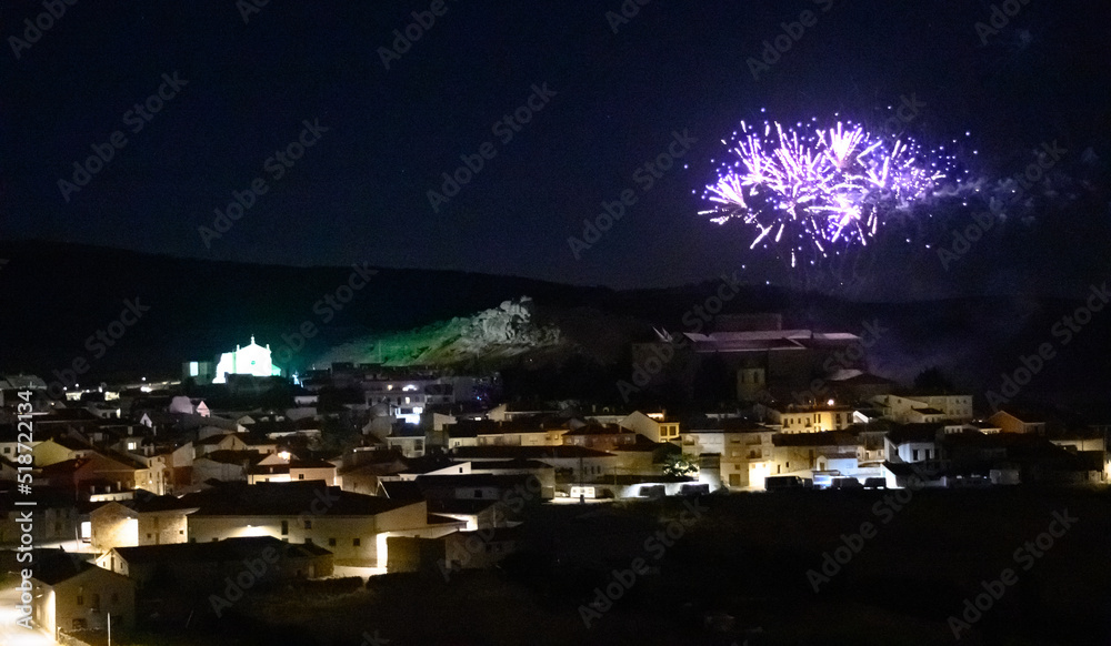 Fototapeta premium fireworks over village castle at night