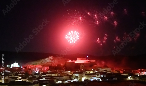 fireworks over village castle at night