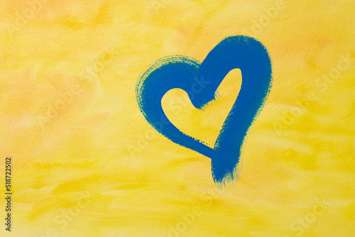 blue heart on a yellow background, a symbol of independence in Ukraine, war in Ukraine