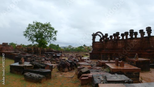 4k shot of raining at beautiful dome and pillars of historical Indian monument Chhatardi during monsoon at Bhuj, Kutch, Gujarat. photo