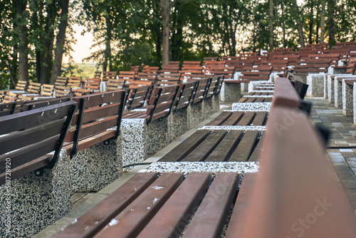 Benches in the park, a place for concerts and festive events. Seats for spectators, observation places. Sampling focus
