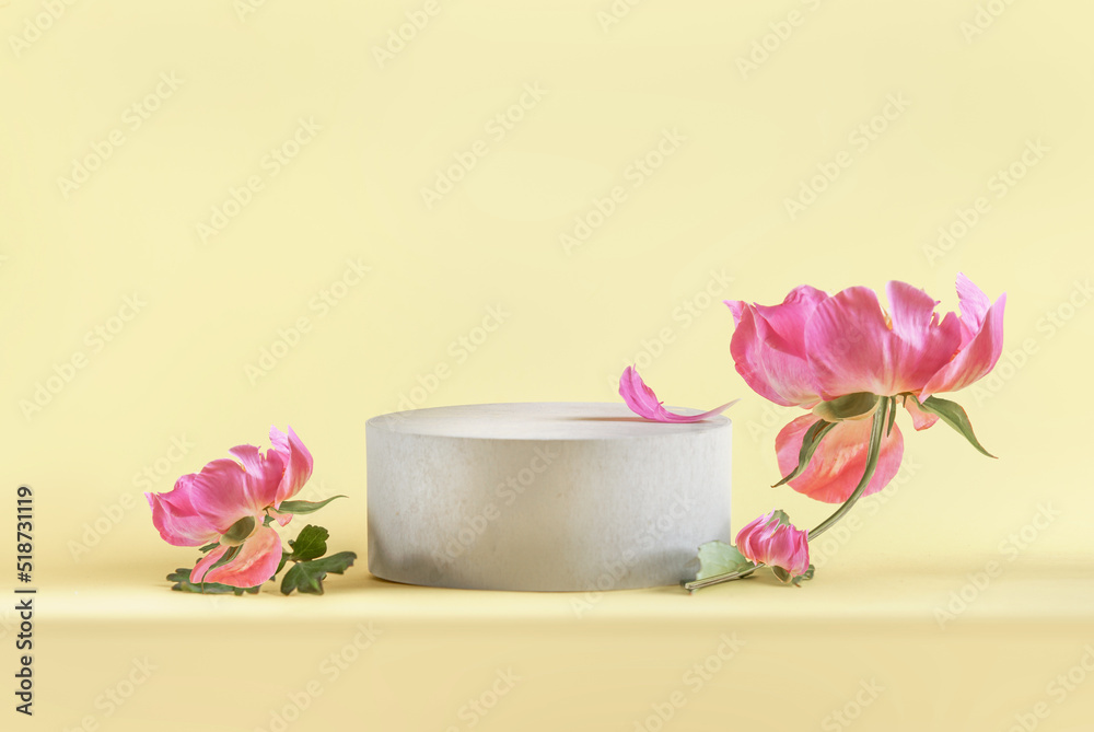Yellow product display with empty podium and pink peony blooms. Scene stage showcase for new products presentation. Yellow product display with empty podium and pink peony blooms. Scene stage showcase for new products presentation.