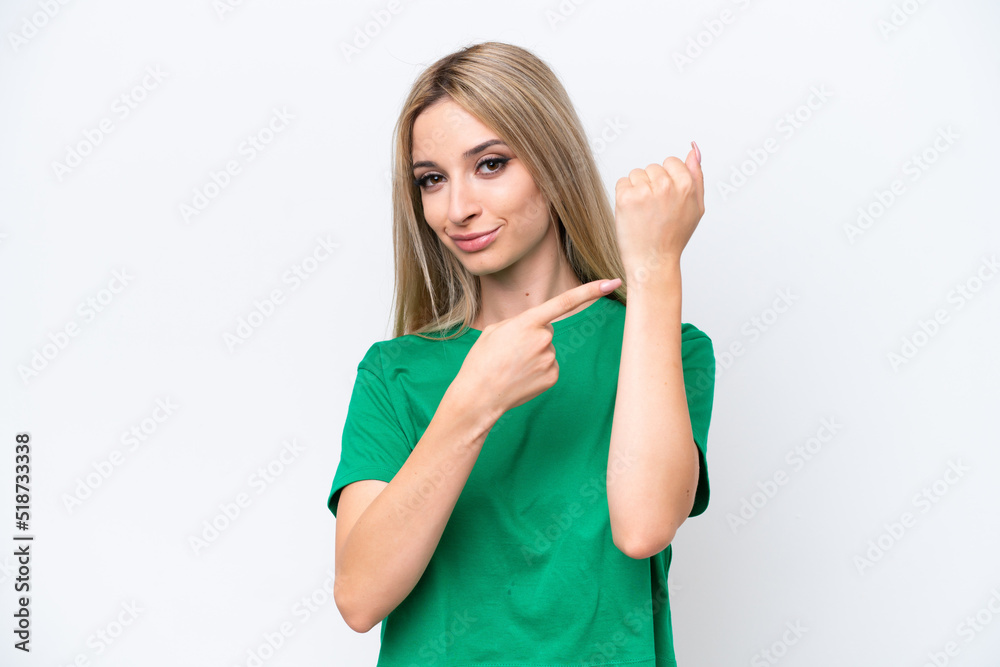 Pretty blonde woman isolated on white background making the gesture of being late Pretty blonde woman isolated on white background making the gesture of being late