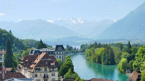 thun village, lake and mountain- Switzerland photo