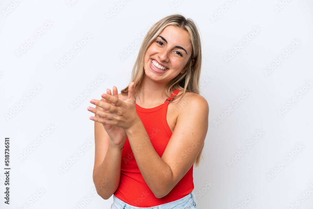 Young caucasian woman isolated on white background applauding after presentation in a conference Young caucasian woman isolated on white background applauding after presentation in a conference