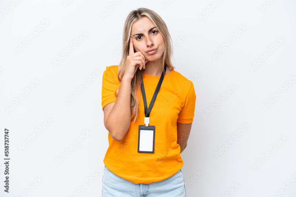 Young caucasian woman with ID card isolated on white background thinking an idea Young caucasian woman with ID card isolated on white background thinking an idea