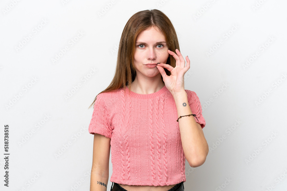 Young English woman isolated on white background showing a sign of silence gesture Young English woman isolated on white background showing a sign of silence gesture