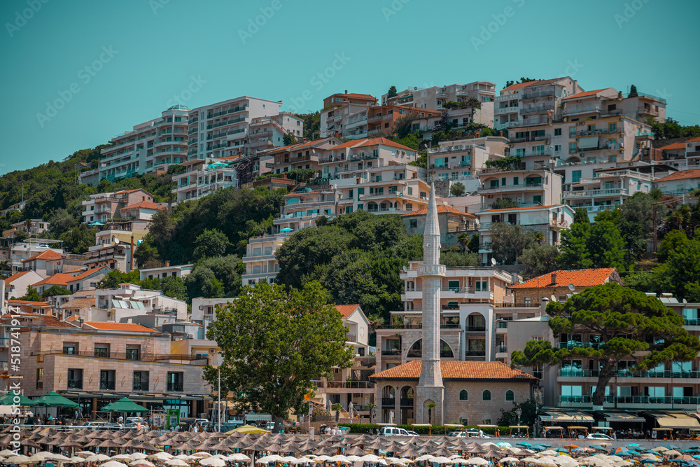 Wide panorama of ulcinj small beach and beachfront, houses in th