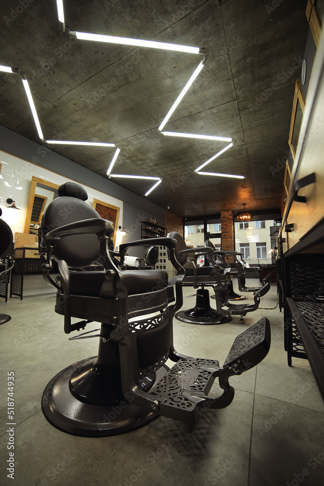 stylish modern empty barbershop interior with chairs, mirrors and lamps.  Barbershop armchair, salon, barber shop for men. Beauty salon for men Stock  Photo | Adobe Stock