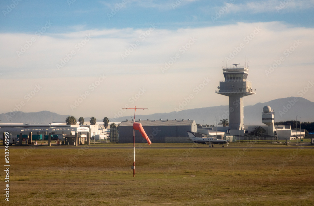 Fototapeta premium Cape Town International Airport in South Africa, South Africa, is one of the best African airports, with a single-engine propeller plane and volume sign.