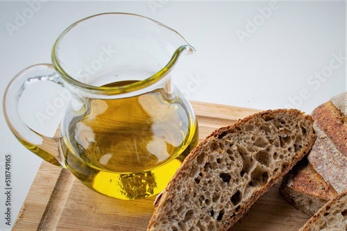 bottle of oil and fresh rye bread