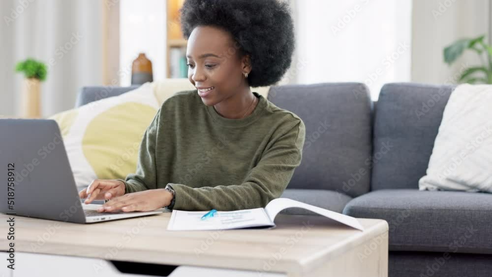 Female student studying using laptop and making notes to prepare for exams or research for college assignment. African paralegal lawyer studying for online degree and reading case study documents Female student studying using laptop and making notes to prepare for exams or research for college assignment. African paralegal lawyer studying for online degree and reading case study documents