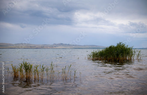 Clouds over the lake. Nature landscape background.