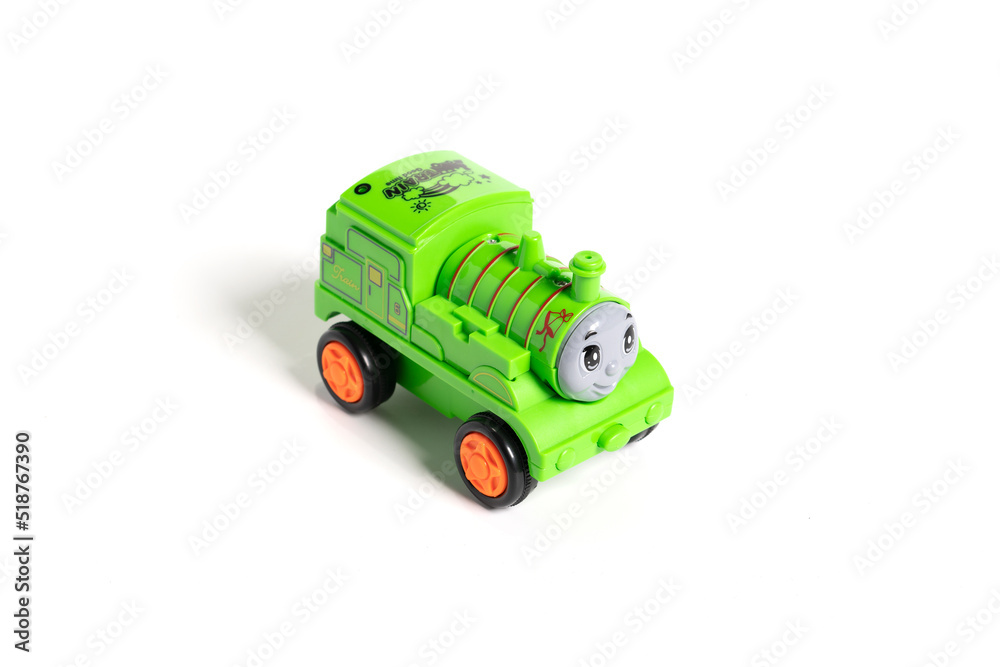 Fototapeta premium Colorful plastic train, isolated on white background.