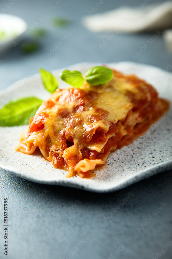 Traditional homemade lasagna with fresh basil Traditional homemade lasagna with fresh basil