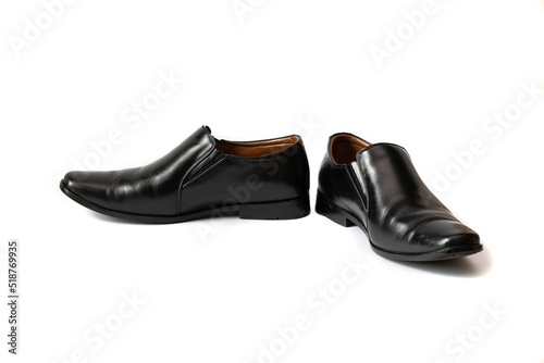 Classic male black leather shoes isolated on a white background