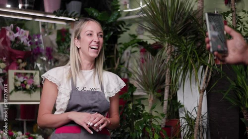 Beautiful girl teaching how to make perfect bouqet flower vase online workshop. Online, education business, flower shop