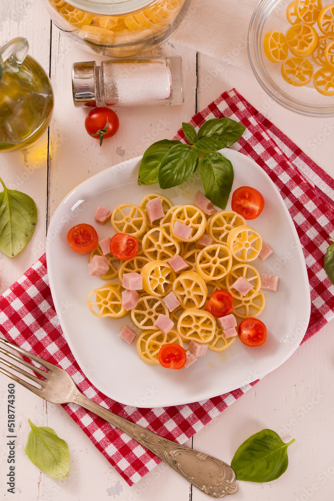 Ruote pasta with tomato and ham. Ruote pasta with tomato and ham.