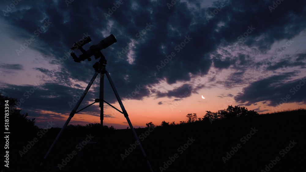 Astronomical telescope and equipment for observing stars, Milky way and planets in nature, far from light pollution and urban zones.