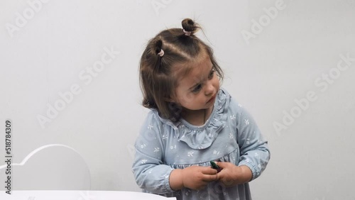 Funny moment. Joyful child delighted with drawing