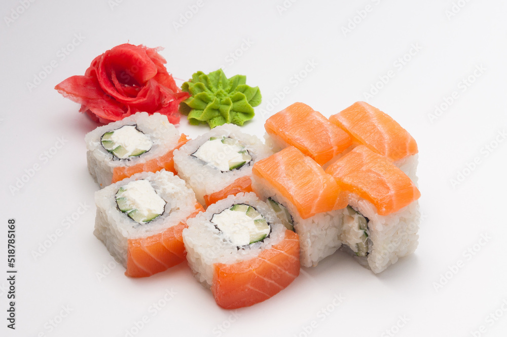 philadelphia sushi rolls: salmon, cream cheese, cucumber on a white background philadelphia sushi rolls: salmon, cream cheese, cucumber on a white background