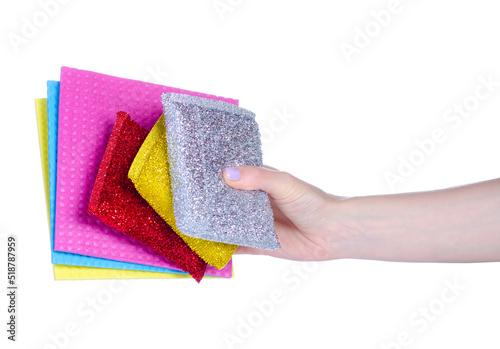 Kitchen sponges and rags scrub in hand on white background isolation © Kabardins photo