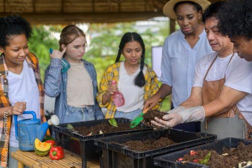 Group of mixed race students and teacher learning agriculture technology in smart farming , education ecology agricultural concepts .