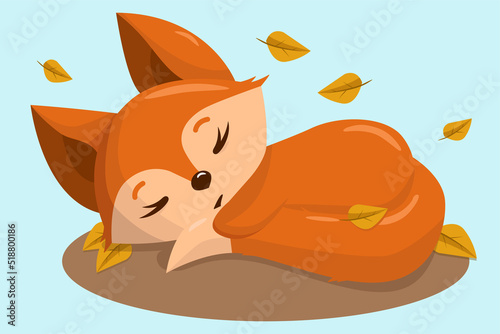 Cute sleeping fox cub in autumn foliage