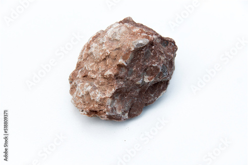 brown stone over white background