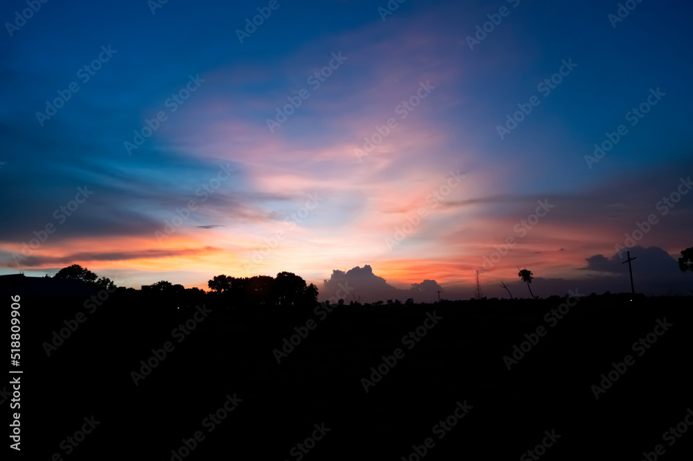 Sunset dramatic sky clouds.vivid sky in twilight time background. Sunset dramatic sky clouds.vivid sky in twilight time background.