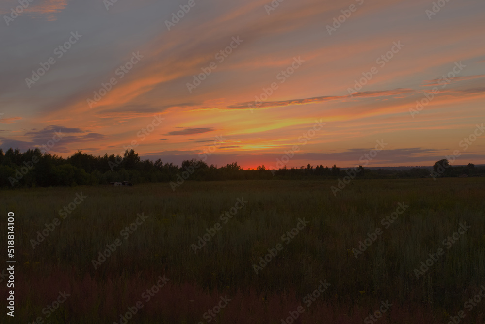 Colorful sunset in summer in the countryside Colorful sunset in summer in the countryside