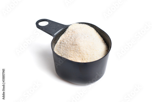 Guar gum, also called guaran, is a galactomannan polysaccharide extracted from guar beans. On white background.