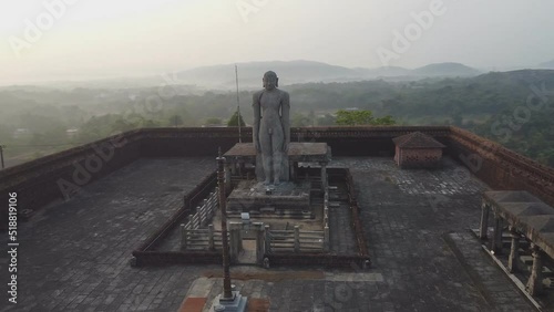 Gomateshwara Statue built in the 15th century. Jain statue stands 40 ft. tall. Karkala, Karnataka, India. (aerial photography)