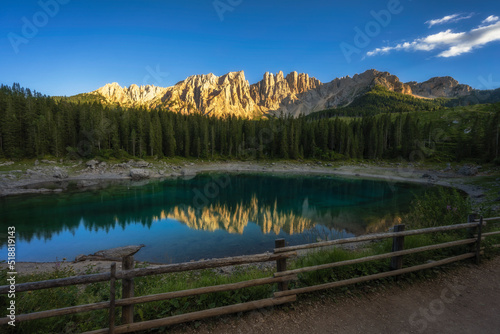 The Carezza lake with a sunset times background © Peerawat