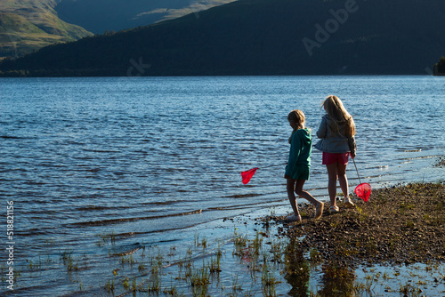Children having fun playing on Loch Lomond Beech 