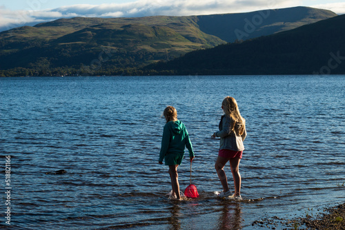 Children having fun playing on Loch Lomond Beech 