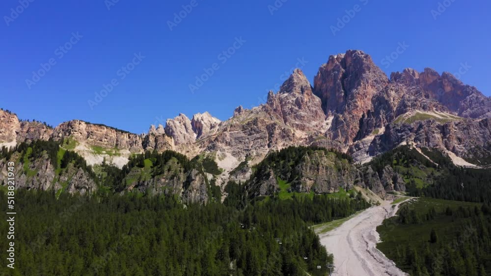 Aerial view of ropeway in Dolomite Mountains, Alps, Italy. Drone footage.