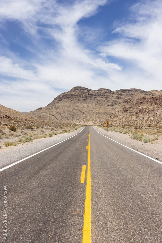 Scenic Road in the desert of American Nature Landscape. Cathedral Gorge State Park, Panaca, Nevada, United States of America. Scenic Road in the desert of American Nature Landscape. Cathedral Gorge State Park, Panaca, Nevada, United States of America.